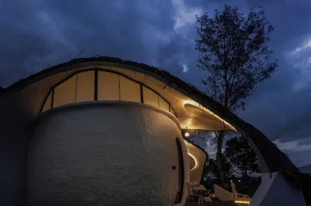 Cozy 2-bedroom cabin in Wayanad, built sustainably amidst lush greener