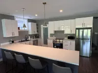 Spacious Walkout Garden-Level Floor W Full Kitchen Hotels in Bedford