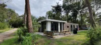 Forest Lodge 111 + Hot tub Het Groene Hert Hotels in Haarle