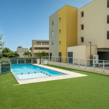 Seaside Apartment with Pool
