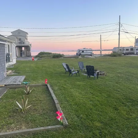 Beach Lovers Paradise! Cozy 3 bedroom home steps from the beach.