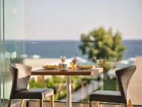 Cavo Orient Beach Hotel & Suites Hôtels à : Arkadii