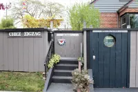 PORTHOLE:  Peaceful with a private, locked, covered patio to relax/ store bikes.