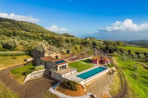A fantastic pool in a Tuscan farmhouse with breathtaking views of the Maremma
