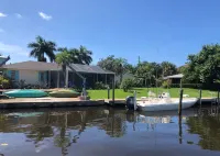 Family beach home! Fully renovated on water w/pool, boat dock & nearby beach