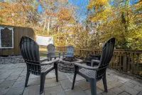 Riverfront Cabin w/ Hot Tub & Outdoor Movie Screen. Quiet Retreat In The Woods!