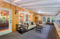 Secluded cabin surrounded by mountains, waterfalls, wildlife, and 50,000 acres