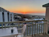 Two bedroom condo with deck overlooking the ocean. Private beach!