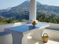 Typical Aeolian house surrounded by Mediterranean nature