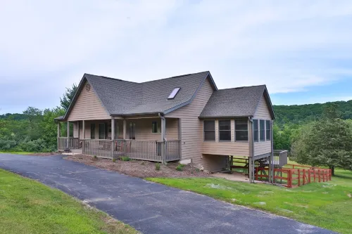 Enjoy Connecting Around the Fire Pit As Well As the View and the Hot Tub