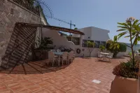 Luxury villa with private heated pool in private garden. Close to beaches.