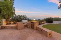Luxury Upscale Modern home located  in the Catalina Foothills. Sleeps 16