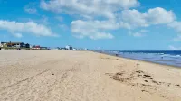 Steps to Beach and Pier Excitement - Charming Coastal Retreat
