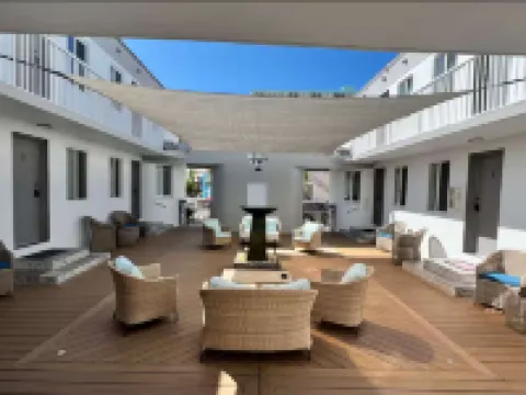 Beach Chairs and Inviting Dining Area - Charming Retreat
