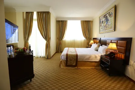 Caravan Hotel Отели рядом с достопримечательностью «AU Conference Center»