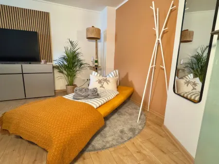 Apartment in the Beachhouse on Lake Goitzsche/2 min. to the beach, barbecue area in the garden Отели в г. Биттерфельд-Вольфен