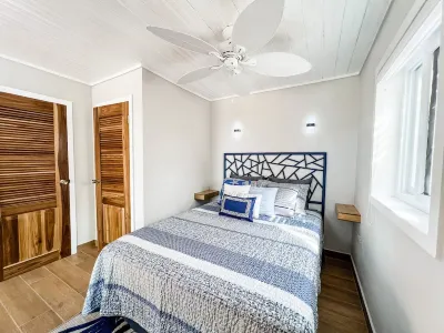 Charming Beachfront Cottage w/ Private Pool in Beautiful Sandy Bay, A/C and WiFi