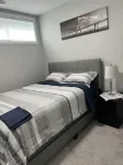 New Cozy 2 bedrooms lower suite with own furnace free prkng 3min to SHC hospital Hotels near Mahogany Village Market