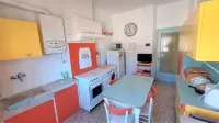 Bright Apartment by the Sea (CIN: IT011017C2XY7OAMU4)