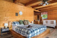 Cabin on 35 acres w/private lake for fishing, fenced yard, hot tub, pool table