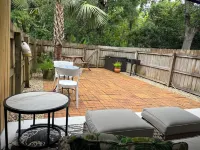Family Friendly Condo minutes to beach w/ large pool and private outdoor space.