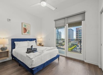 Chic Downtown Stay + Walk to Beach