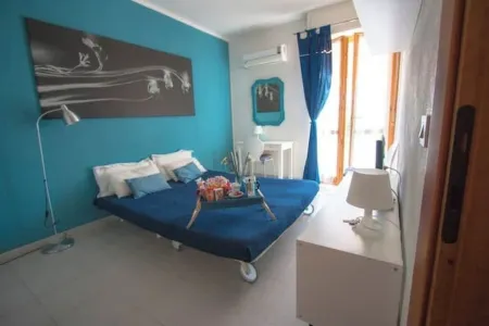 Blue apartment Alghero, within walking distance of the sea and the old town.