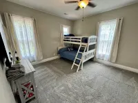 Burnside Boathouse – Cozy 5 Bedroom Lake Retreat Steps from Marina & Local Eats Hotels in Burnside