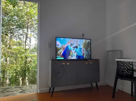 Cozy Chalet Surrounded by Nature in a Gated Community (101) Отели рядом с достопримечательностью «Templo Zu Lai»