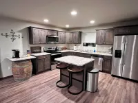 The place to stay: pool table, king bed.