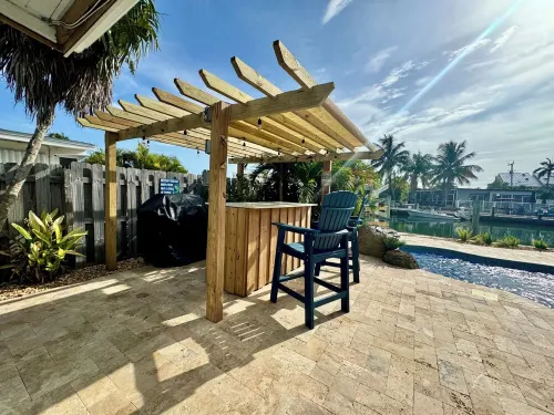 SC2 11th ST. in Kcb. Best Home Away from Home – 2Br/2BA with Private Pool & Dock