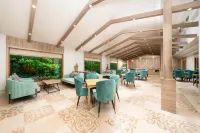Purple Palms Resort & Spa Coorg, a member of Radisson Individuals Premier - breakfast