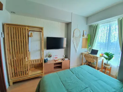 Cozy and Great Choice Studio at Grand Kamala Lagoon Apartment