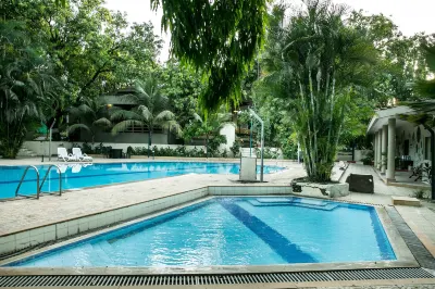 Ras by Treat Resorts, Silvassa - Отели рядом с достопримечательностью «Dhudhani lake view point»