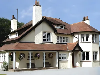 Rivendell Hotel dekat Noblehill Cafe