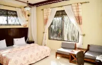 Country Lake Resort Garuga Hotels near Kyewaga Central Forest Reserve