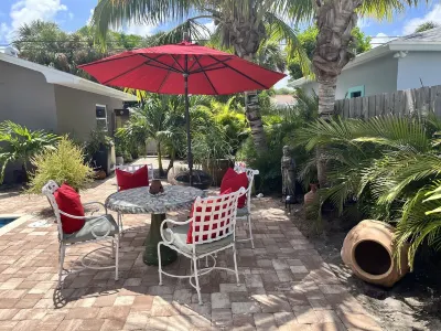 Chill on the Patio Overlooking the Pool & Lush Gardens & Grill Your Dinner!