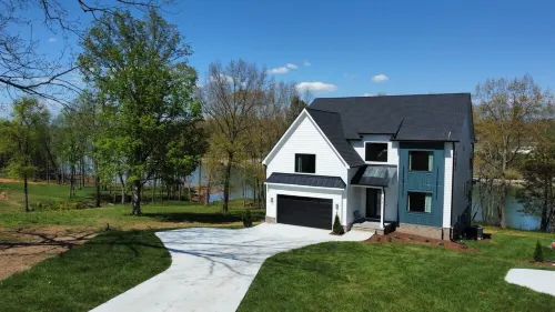 Lakeshore Modern!  Lake Front with Platform Dock and 2 Kayaks, Firepit and Views