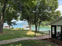 PERFECT LOCATION! Sloping lot, mountain view,  and great cove!