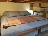Off-grid tiny home on 6 secluded acres w/ outdoor soaking tubs and sauna!