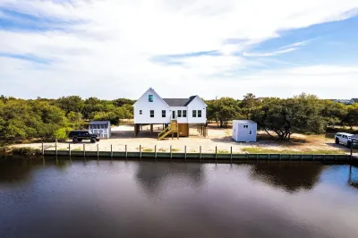 New CANAL front home a few rows back from the OCEAN! Beach passes provided!