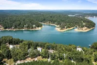 Cozy lakefront home with beautiful views, fire pit & private dock.
