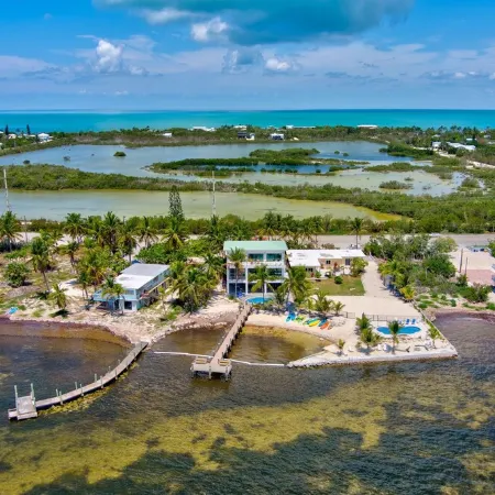 Wide Horizon oceanfront.  4 bedroom, 4 ½ bath,  kayaks, pool + observation deck.