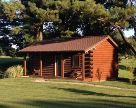 Rest, Relax and Renew. Our log cabin experience awaits your arrival. Hotels in Stokes