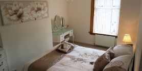 Bright, spacious centrally-located 3-bedroomed house with ample free parking.