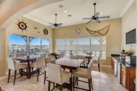 NEW MODERN COASTAL CONDO……GORGEOUS RIVER VIEWS!