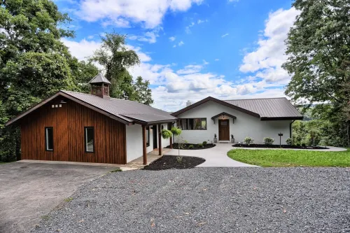 Private, modern home with river view, on 48 acres