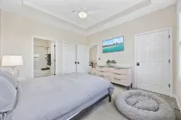 Modern Golf-View Condo • Barefoot Resort • Pools • Beach Gear Included