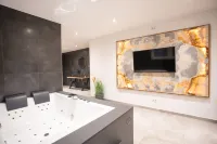 To pamper yourself: Whirlpool, sauna, relaxation area, garden, barbecue, view of the mountains