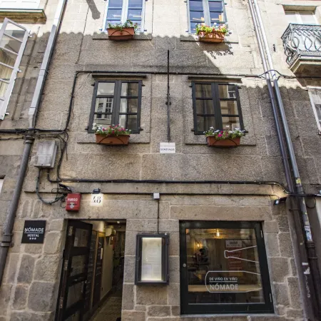 Hostal Nomade Santiago Отели рядом с достопримечательностью «Дворец Фонсека»